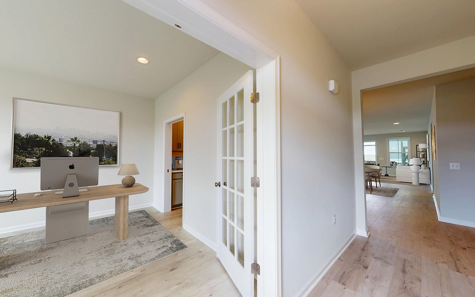 The foyer and dining/flex room of the Rockwell at Hiatt Pointe at Snowden Bridge.