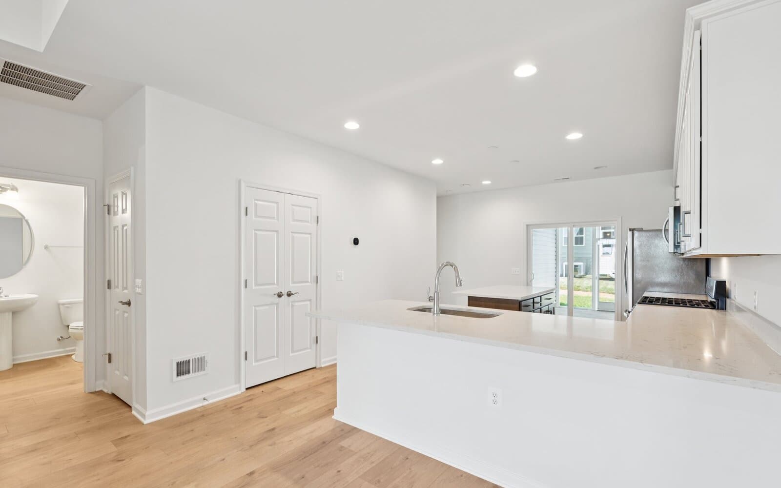 The kitchen of the Northgate by Brookfield Residential on homesite 1002 at Hiatt Pointe at Snowden Bridge.