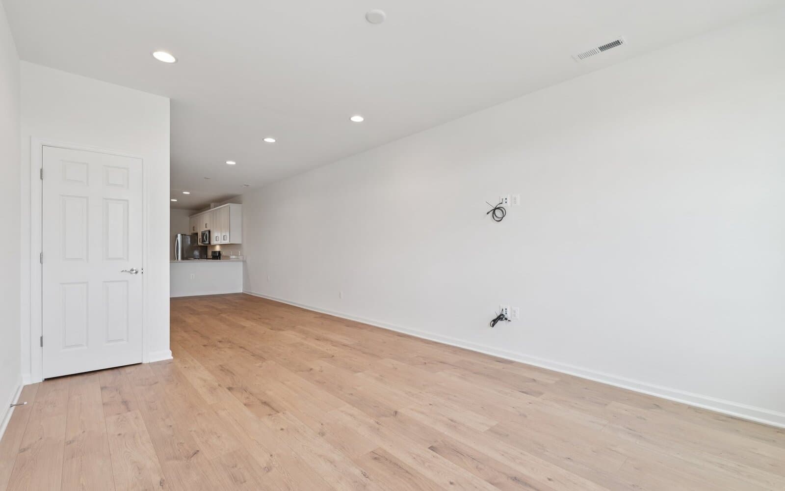 The living room of the Northgate by Brookfield Residential on homesite 1002 at Hiatt Pointe at Snowden Bridge.