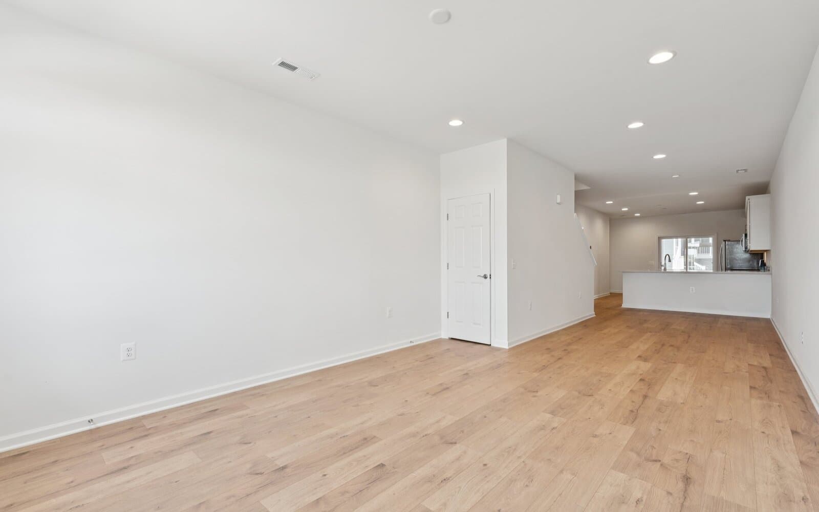 The living room of the Northgate by Brookfield Residential on homesite 1002 at Hiatt Pointe at Snowden Bridge.