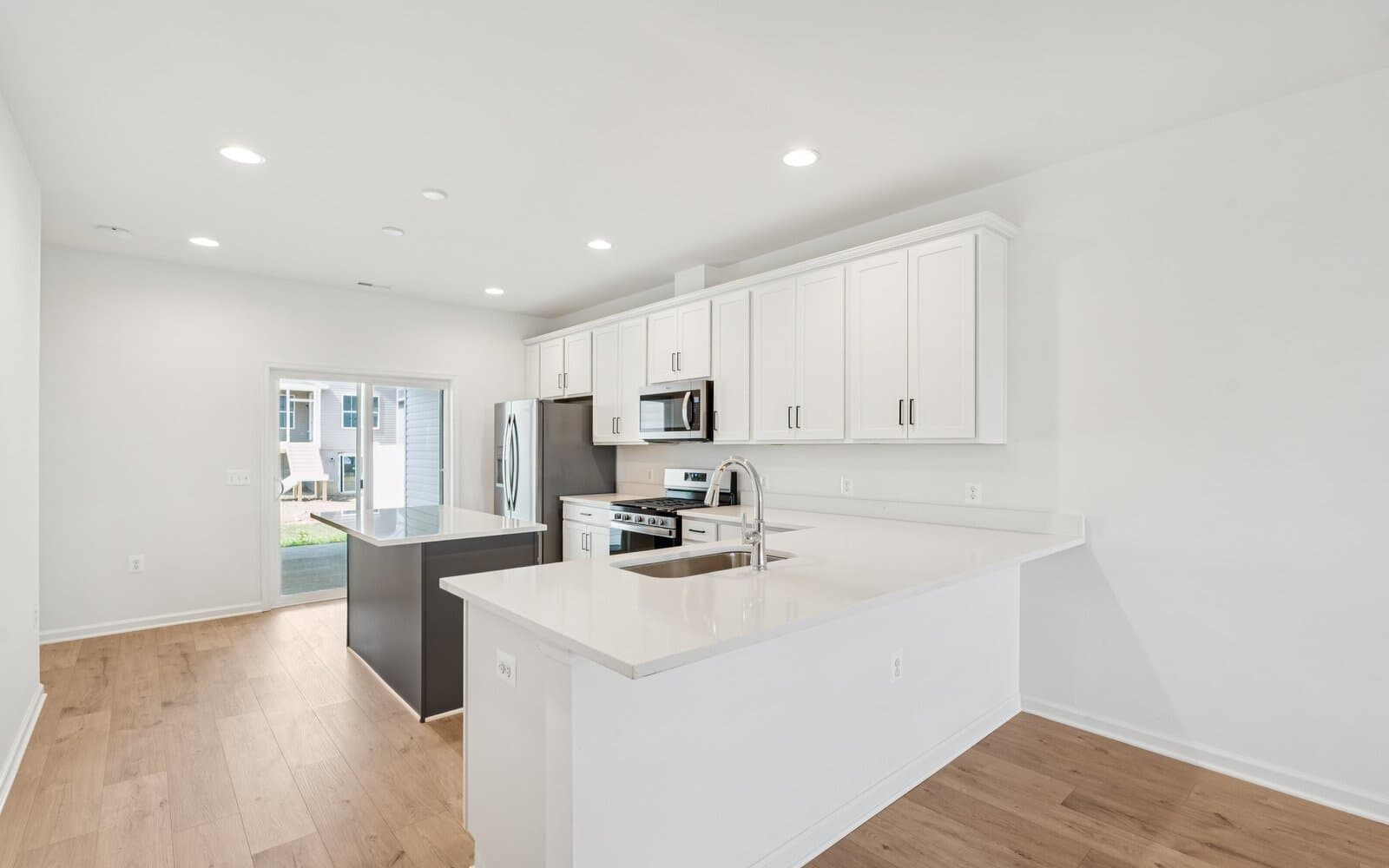 The kitchen of the Northgate on Homesite 1003 by Brookfield Residential at Hiatt Pointe at Snowden Bridge.