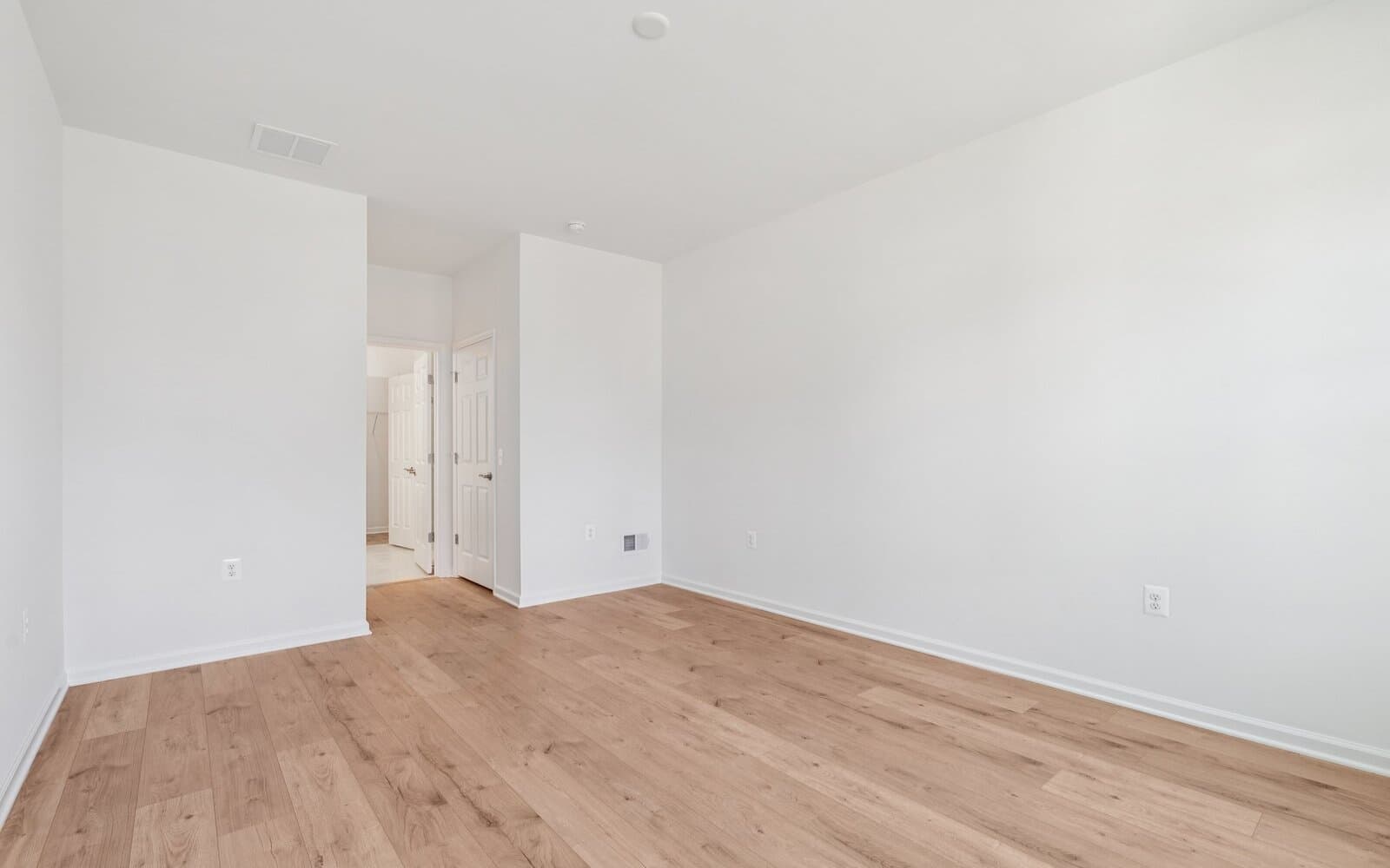 The main level primary suite of the Northgate on Homesite 1003 by Brookfield Residential at Hiatt Pointe at Snowden Bridge.