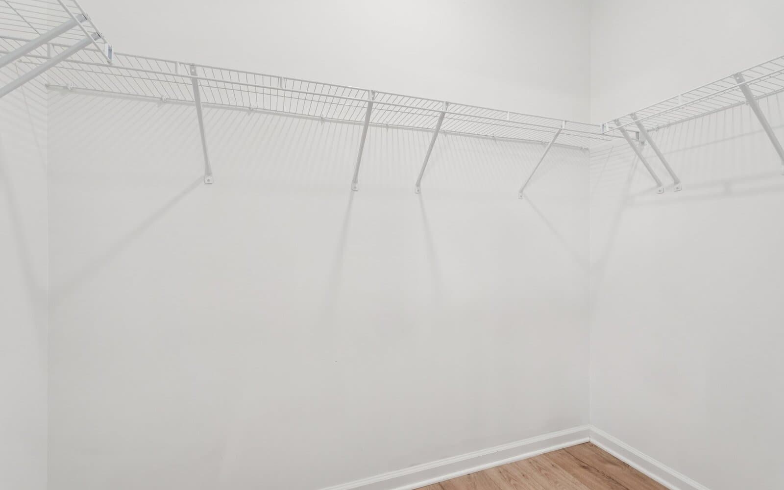 The main level primary suite walk-in closet of the Northgate on Homesite 1003 by Brookfield Residential at Hiatt Pointe at Snowden Bridge.