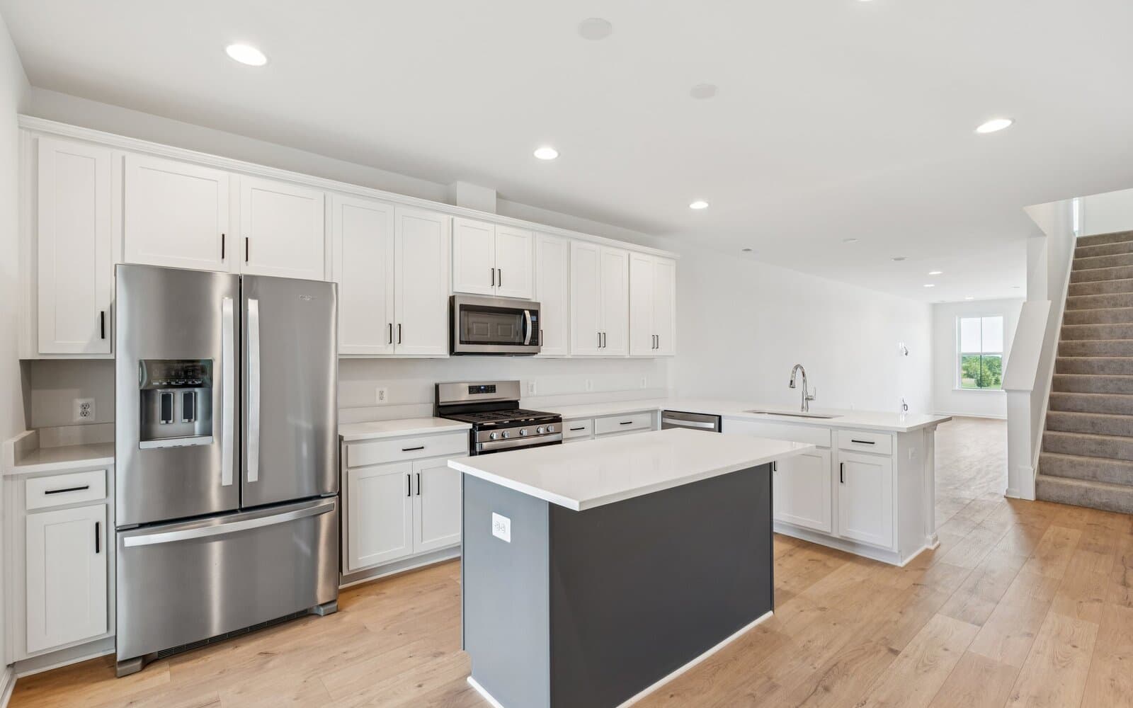 The kitchen of the Northgate on Homesite 1003 by Brookfield Residential at Hiatt Pointe at Snowden Bridge.