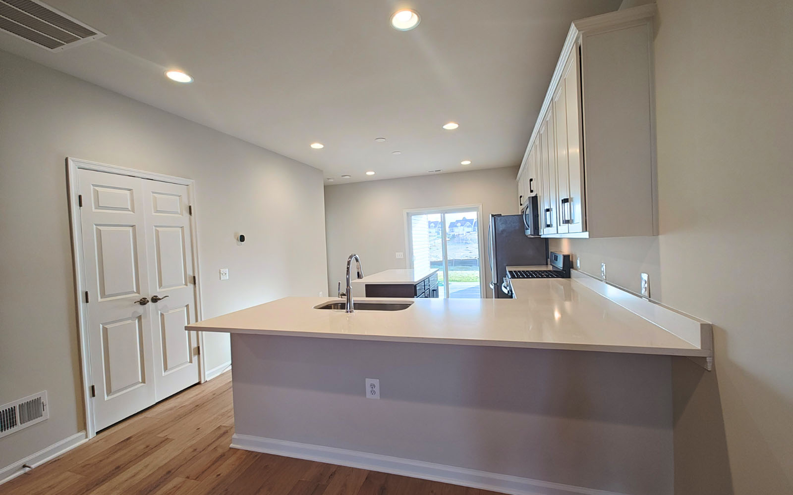 The kitchen of the Northgate on homesite 1009 at Hiatt Pointe at Snowden Bridge.