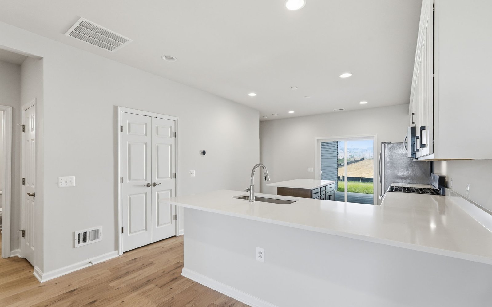 The kitchen of the Northgate on homesite 1009 at Hiatt Pointe at Snowden Bridge.