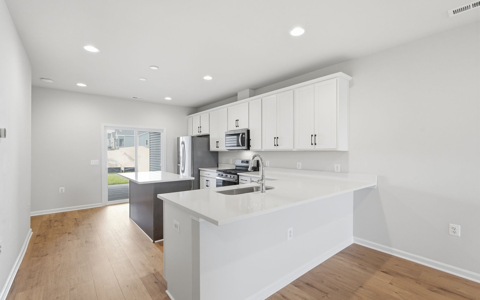 The kitchen of the Northgate on homesite 1009 at Hiatt Pointe at Snowden Bridge.