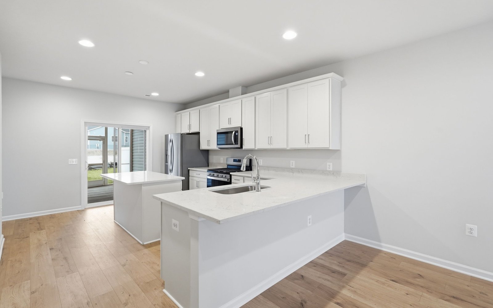 The kitchen of the Northgate on homesite 1010 at Hiatt Pointe at Snowden Bridge.