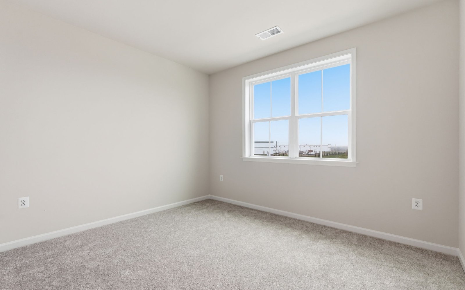 A secondary bedroom of the Northgate on homesite 1010 at Hiatt Pointe at Snowden Bridge.