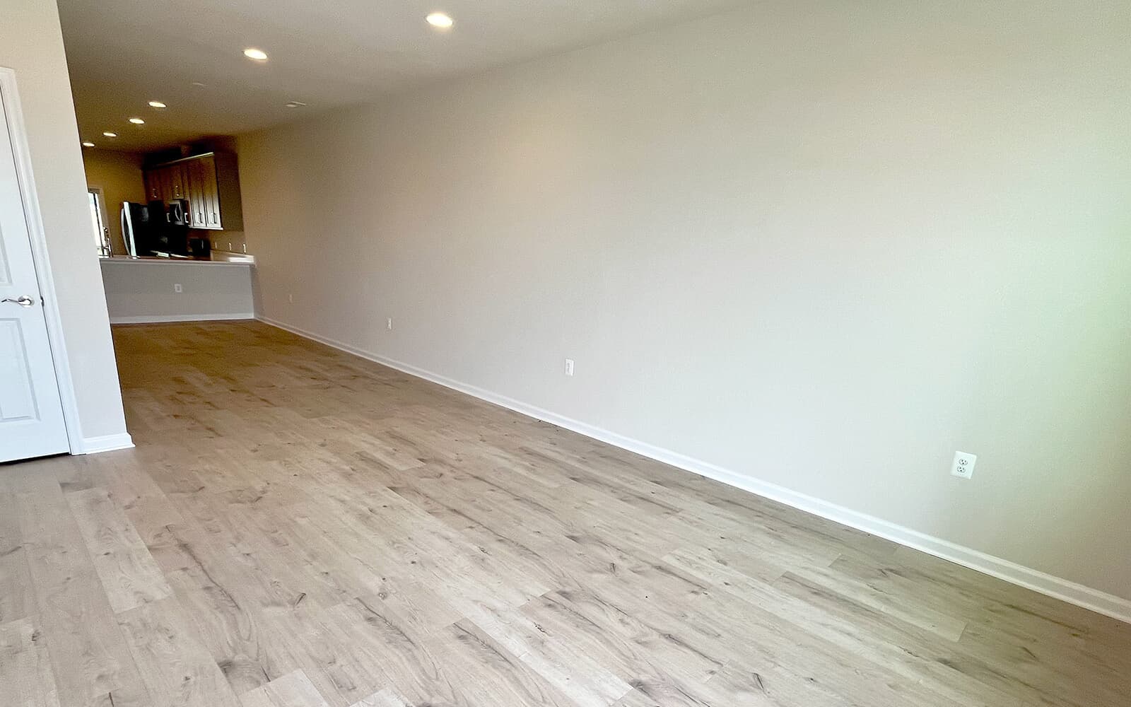 The family room in the Northgate on homesite 1012 at Hiatt Pointe at Snowden Bridge by Brookfield Residential.