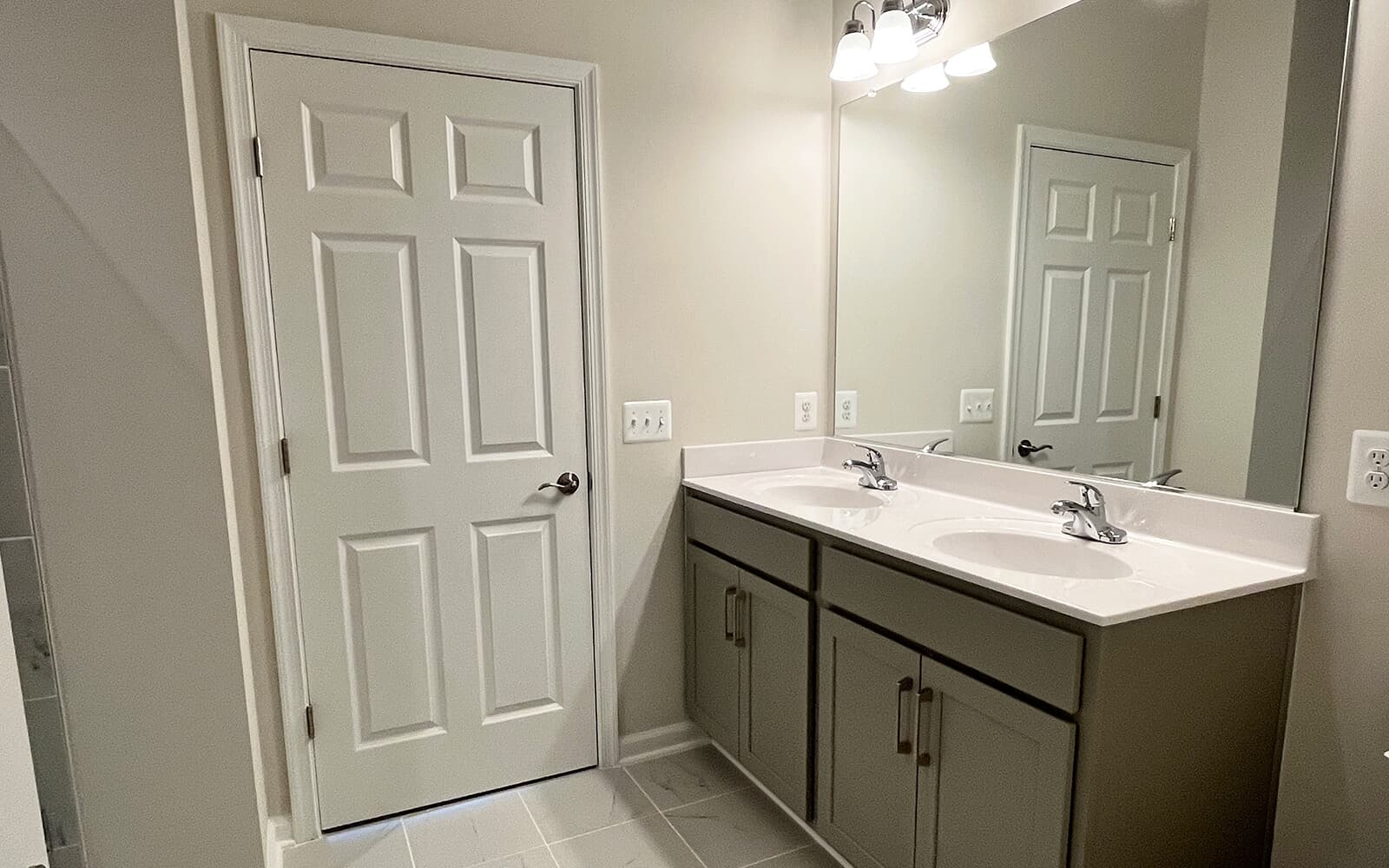 The primary bathroom in the Northgate on homesite 1012 at Hiatt Pointe at Snowden Bridge by Brookfield Residential.