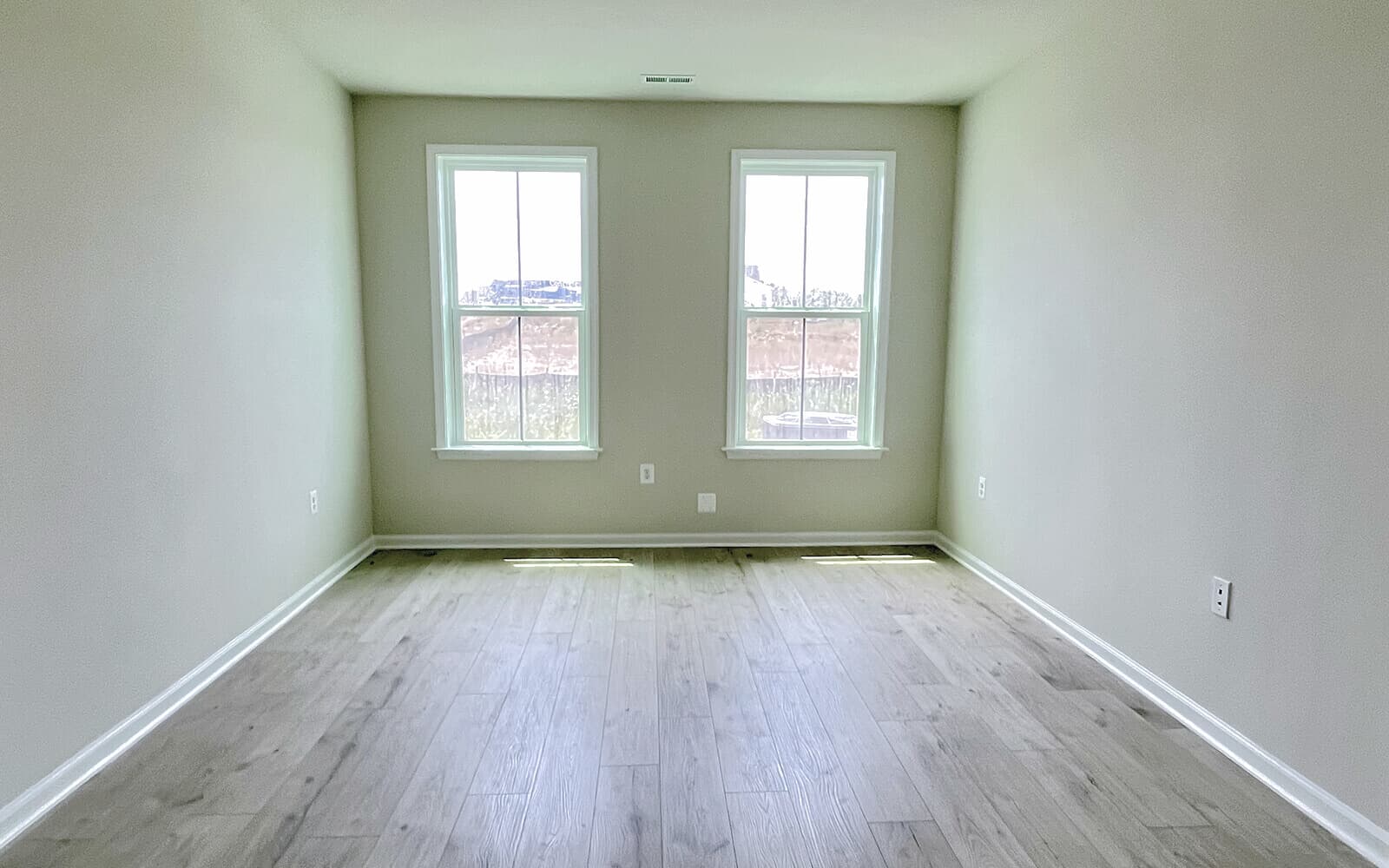 The primary bedroom in the Northgate on homesite 1012 at Hiatt Pointe at Snowden Bridge by Brookfield Residential.