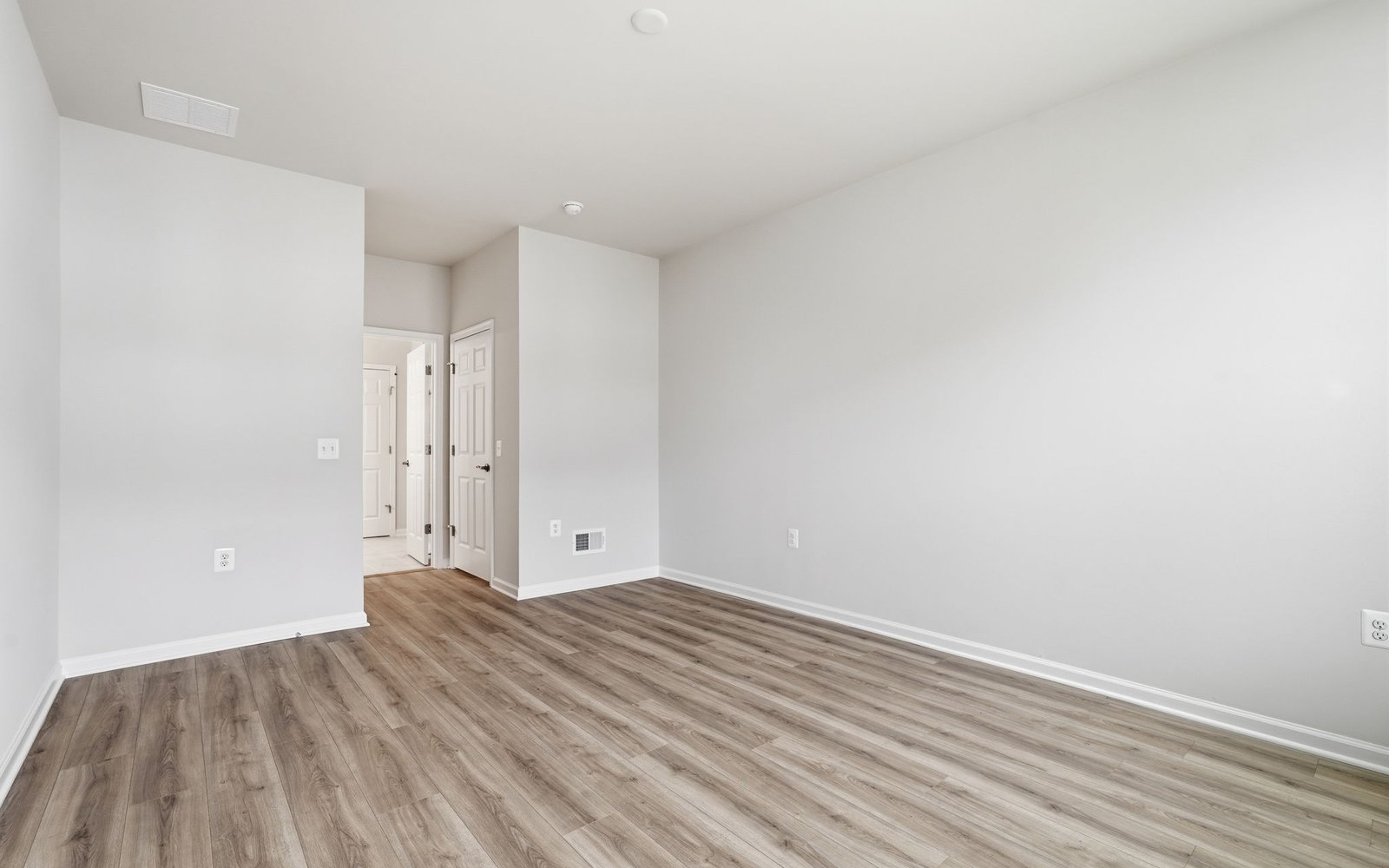 The main level primary bedroom of the Northgate on homesite 1099 at Hiatt Pointe at Snowden Bridge.