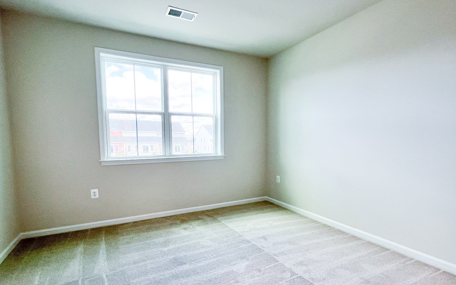 A secondary bedroom of the Northgate on homesite 1011. 