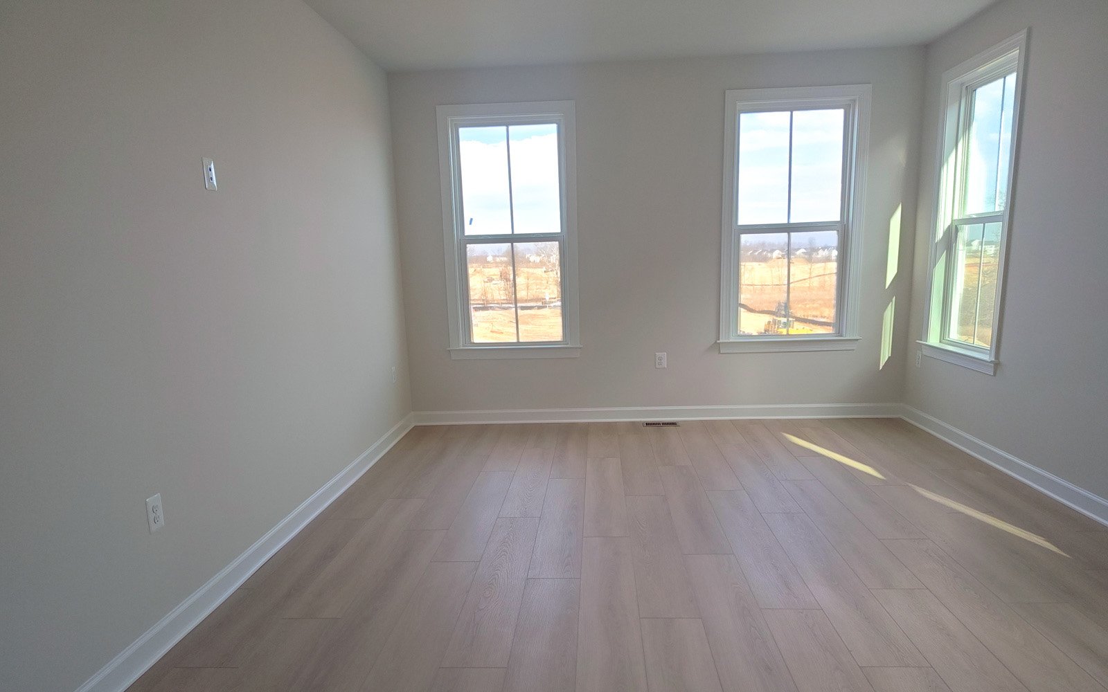 The primary bedroom of the Rembrandt on homesite 2087.