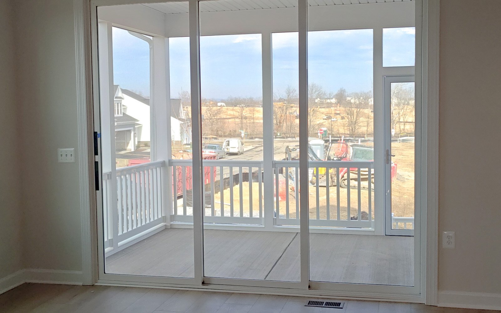 The screened porch of the Rembrandt on homesite 2087.
