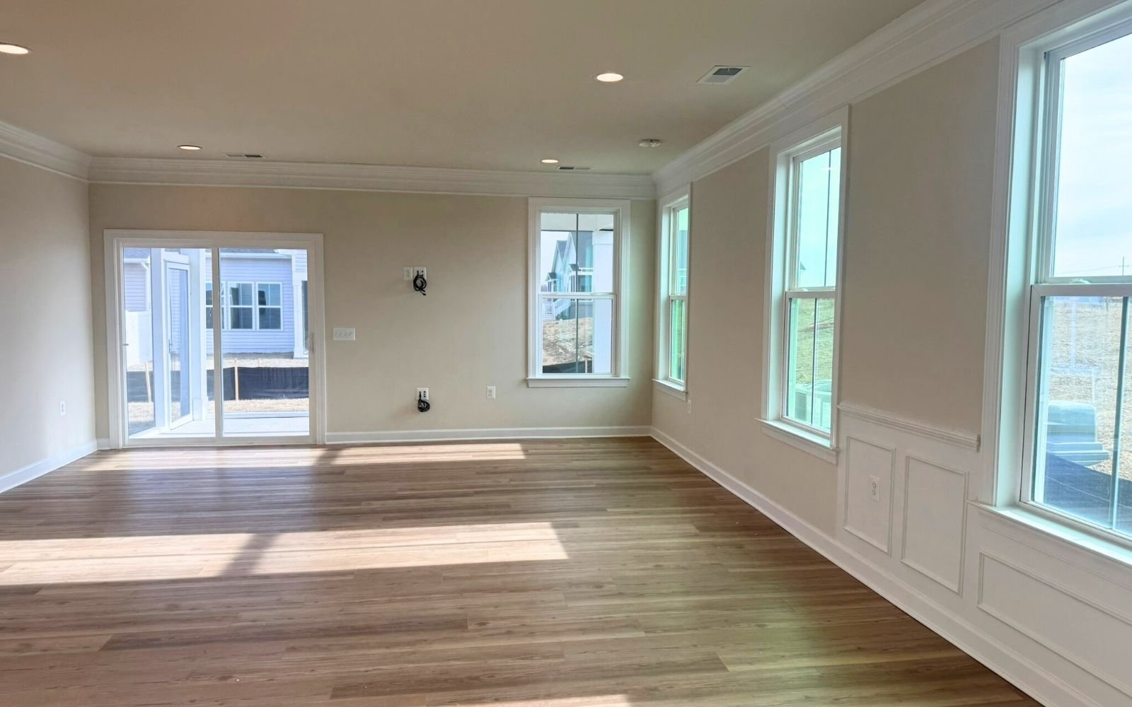 The family room of the Hemingway on homesite 2110 at Hiatt Pointe at Snowden Bridge.
