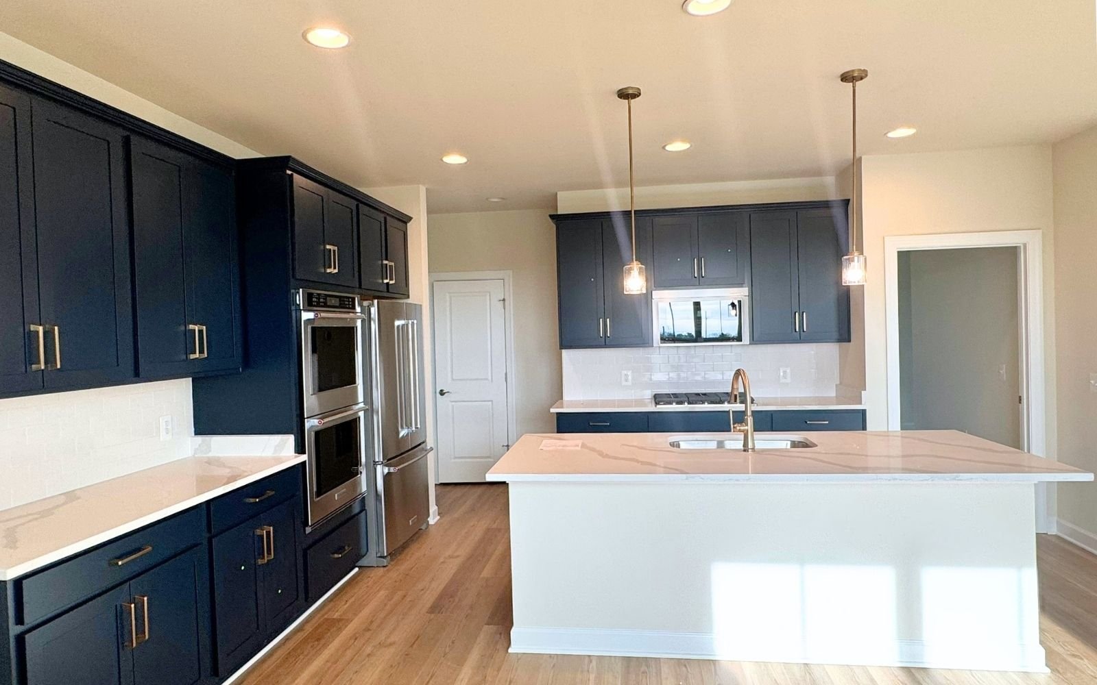 The kitchen of the Hemingway on homesite 2110 at Hiatt Pointe at Snowden Bridge.