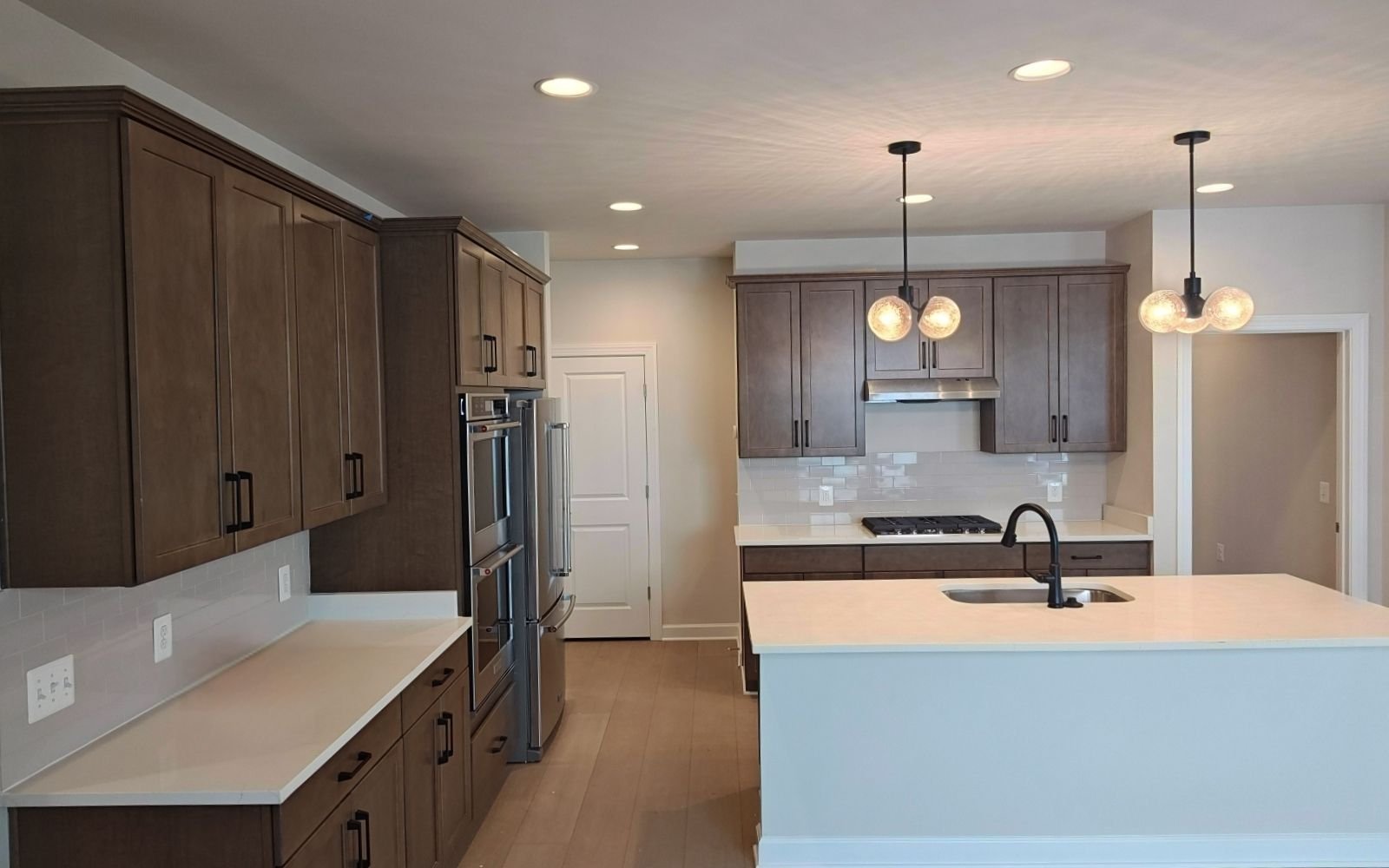 The kitchen of the Hemingway on homesite 2118 at Hiatt Pointe at Snowden Bridge.