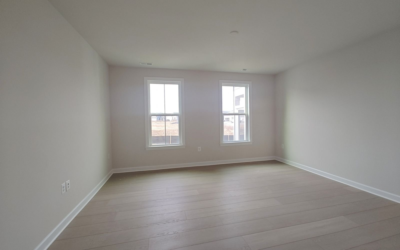 The primary bedroom of the Hemingway on homesite 2118 at Hiatt Pointe at Snowden Bridge.