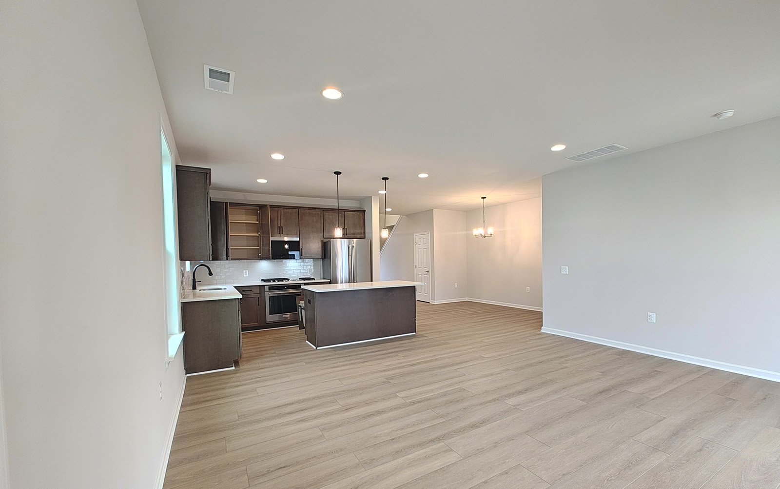 The kitchen and family room of the Fitzgerald on homesite 2120.