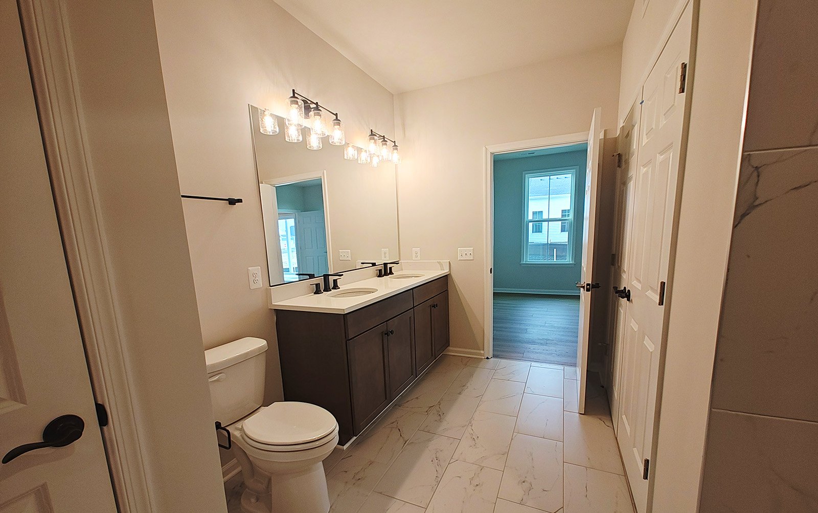 The main level primary bathroom of the Fitzgerald on homesite 2120.