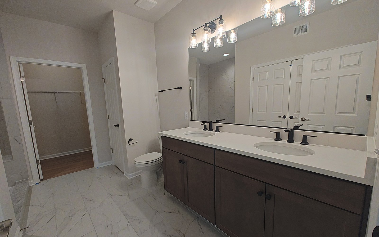 The main level primary bathroom of the Fitzgerald on homesite 2120.