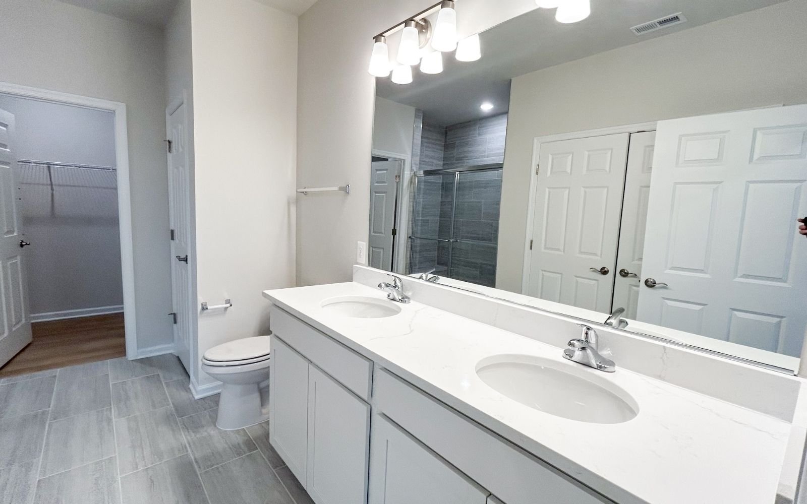 The primary bathroom of the Fitzgerald on homesite 2003 at Hiatt Pointe at Snowden Bridge.