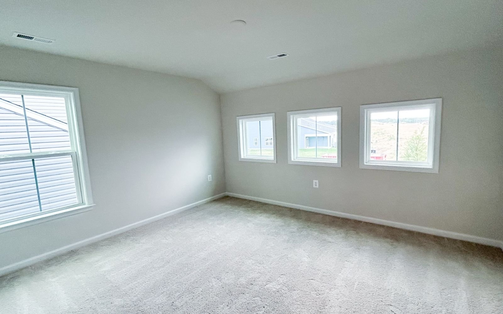 The primary bedroom of the Fitzgerald on homesite 2003 at Hiatt Pointe at Snowden Bridge.