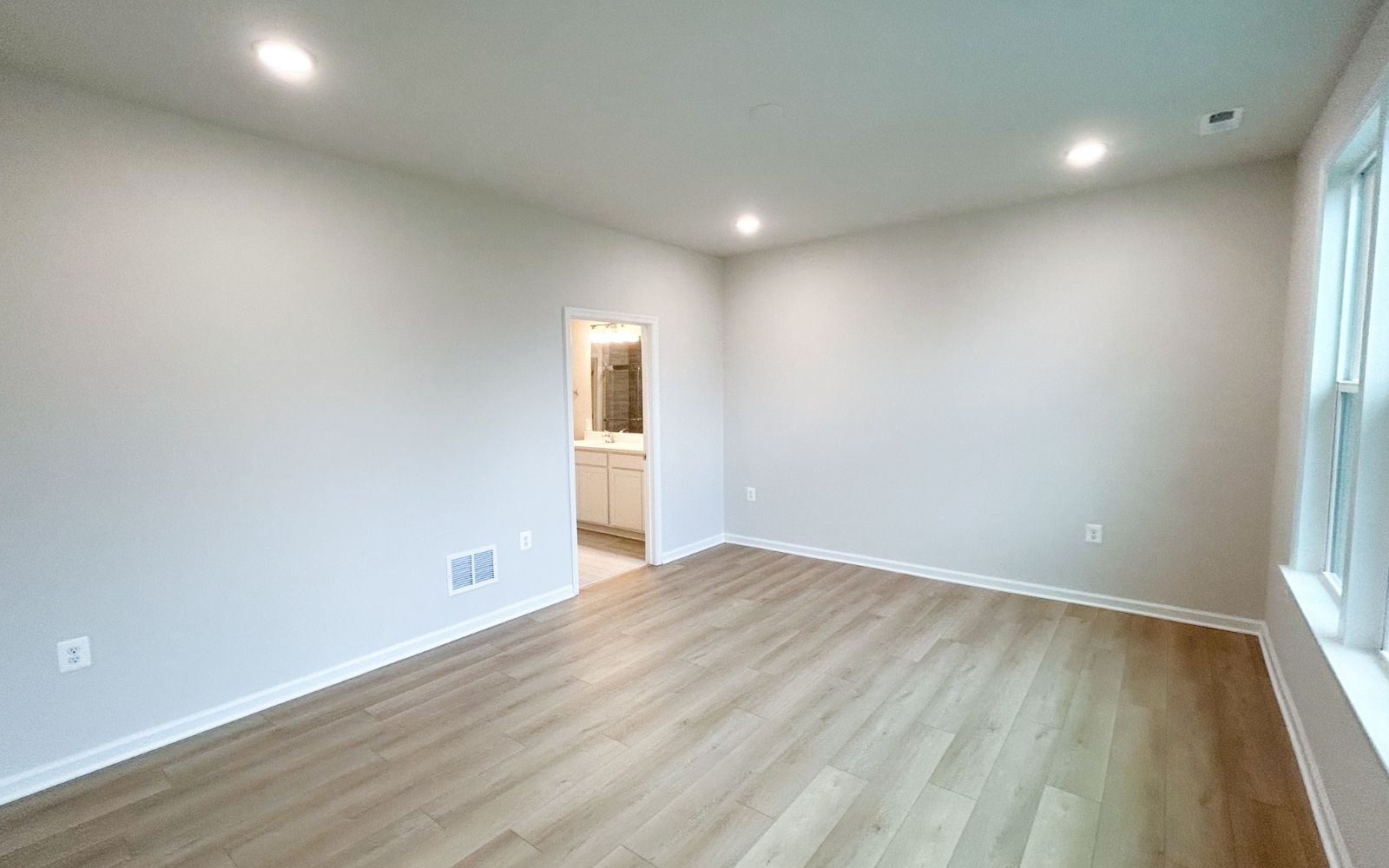 The primary bedroom of the Fitzgerald on homesite 2003 at Hiatt Pointe at Snowden Bridge.