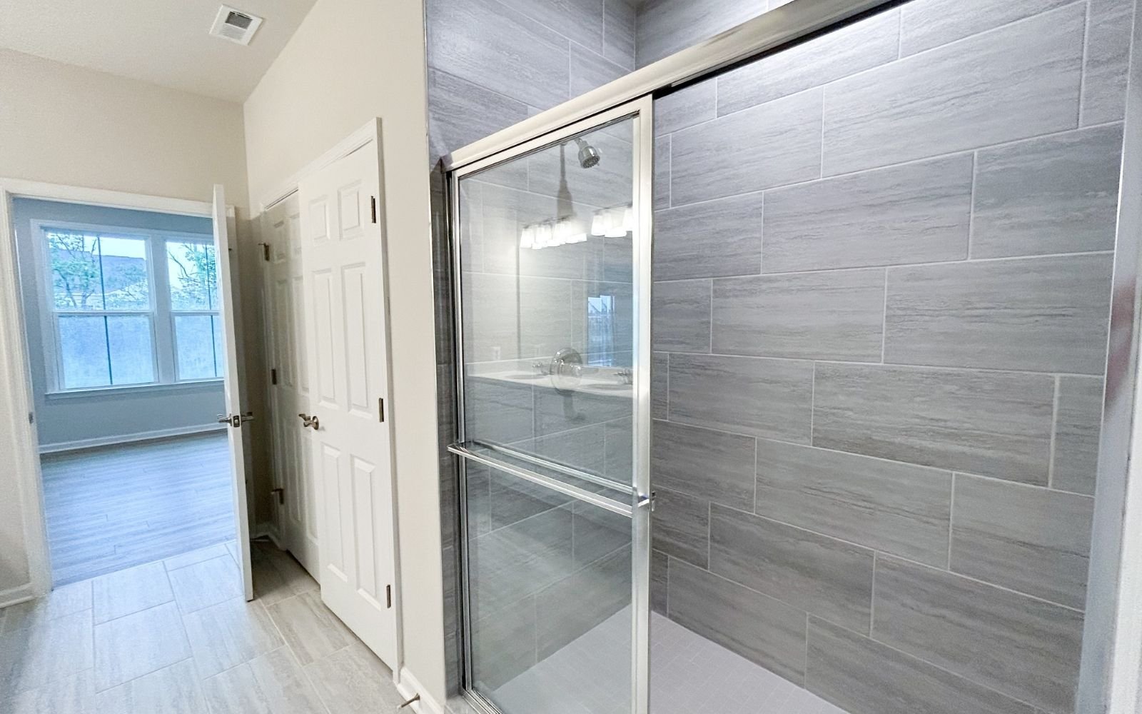 The primary bathroom of the Fitzgerald on homesite 2003 at Hiatt Pointe at Snowden Bridge.