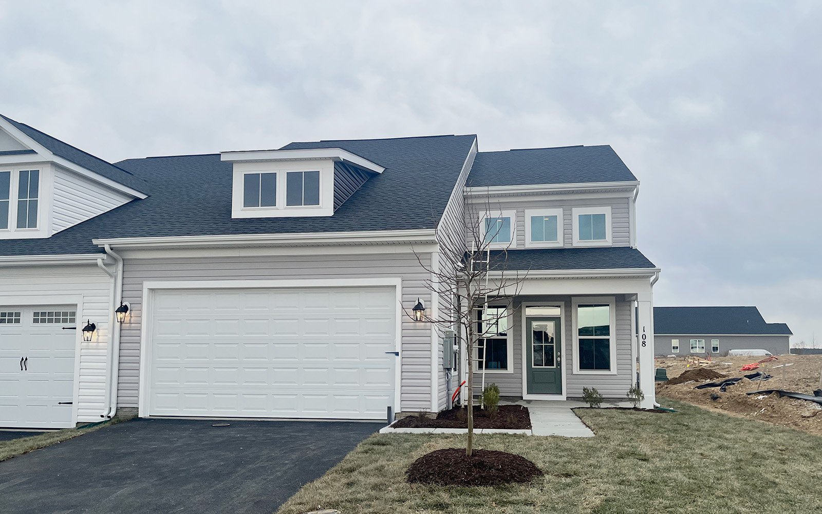 The exterior of the Hemingway on homesite 2010 at Hiatt Pointe at Snowden Bridge.