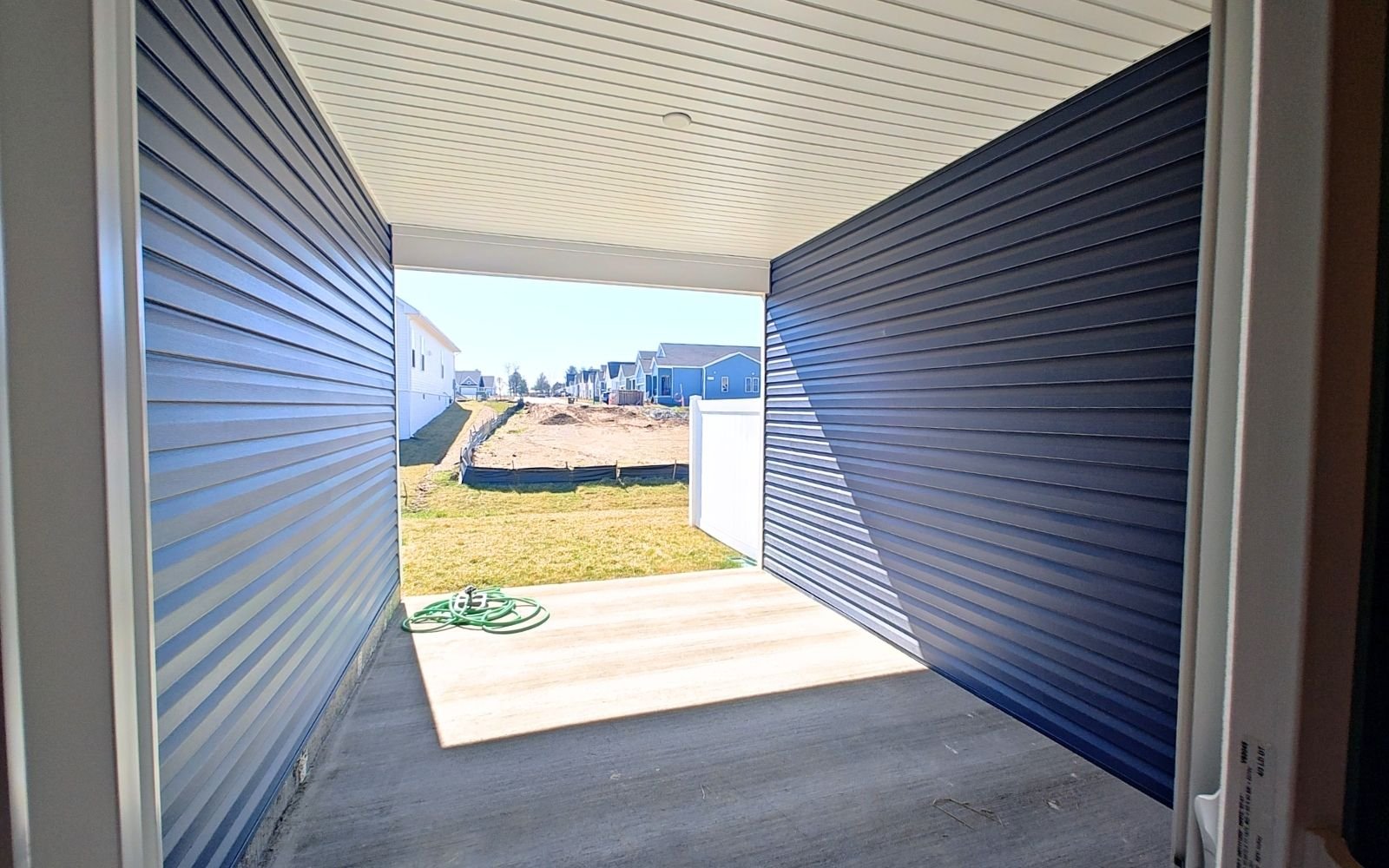 The rear patio of the Northgate on homesite 1008 at Hiatt Pointe at Snowden Bridge.