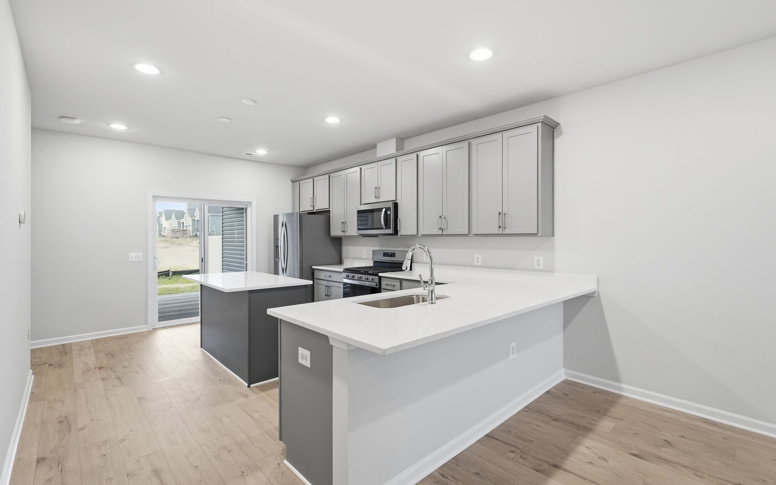 The kitchen in the Northgate on homesite 1008 at Hiatt Pointe at Snowden Bridge.
