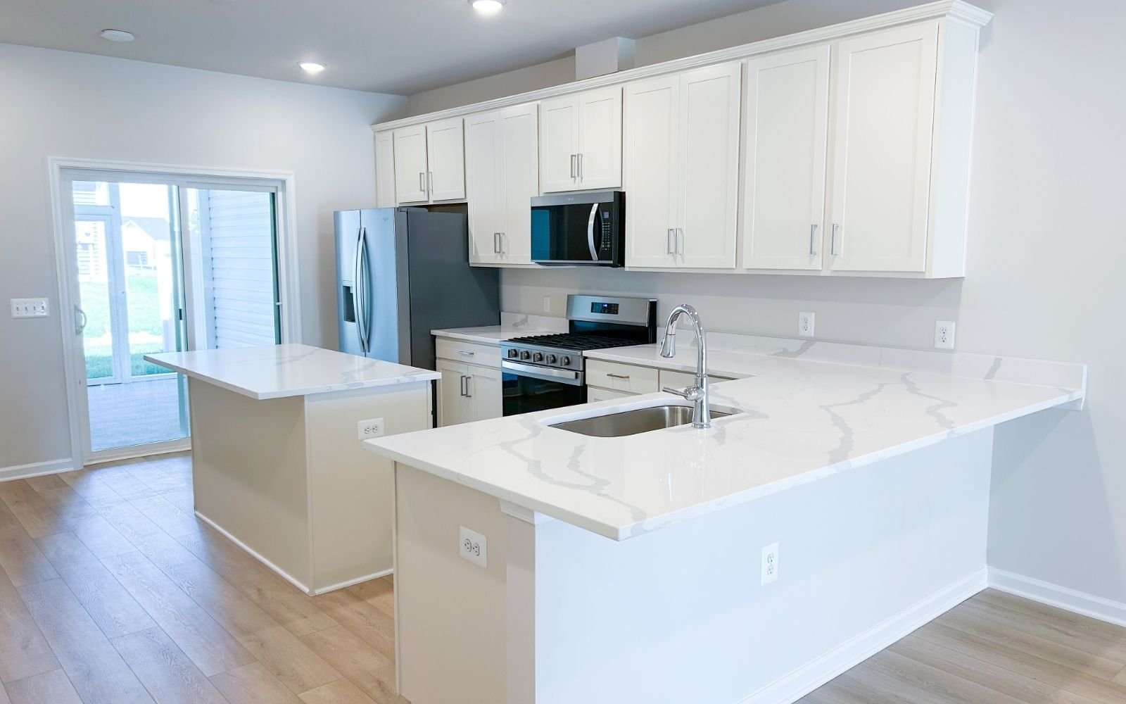 The kitchen of the Northgate on homesite 1102 at Hiatt Pointe at Snowden Bridge.