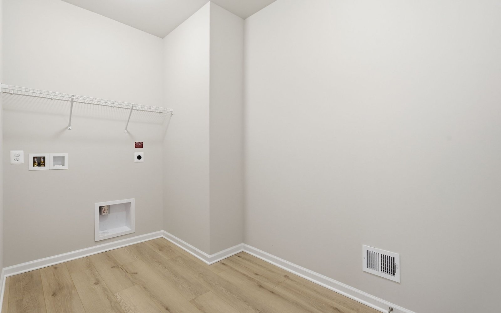 The laundry of the Rockwell on homesite 1121 at Hiatt Pointe at Snowden Bridge.