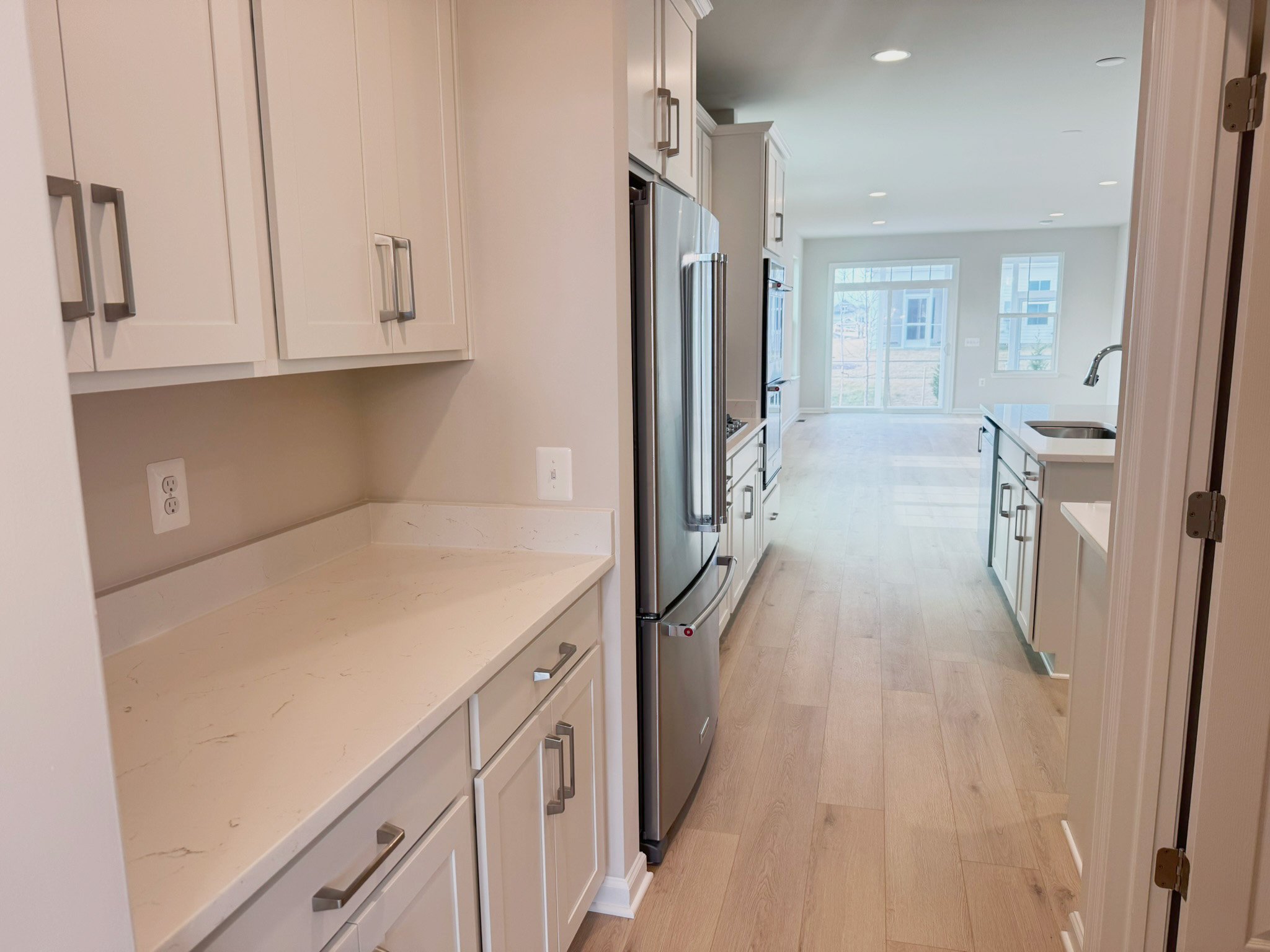 The kitchen of the Rockwell on homesite 1121 at Hiatt Pointe at Snowden Bridge.