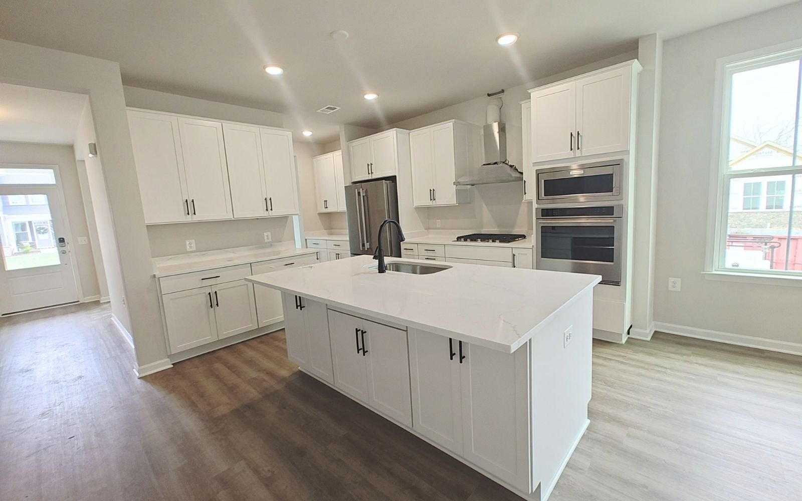 The kitchen of the Rockwell on homesite 2127 at Hiatt Pointe at Snowden Bridge.