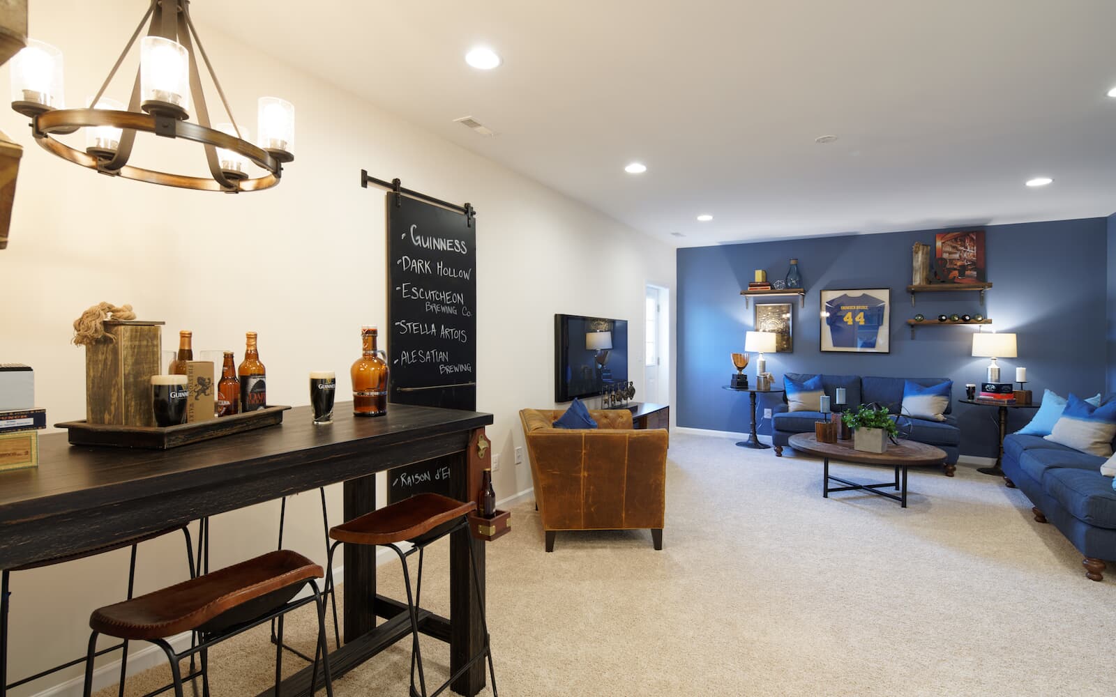 The lower level recreation room in the Pendleton home design by Brookfield Residential in Snowden Bridge