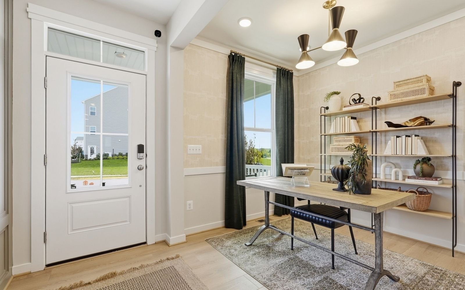 The foyer and study of the Sinclair model home at Snowden Bridge.