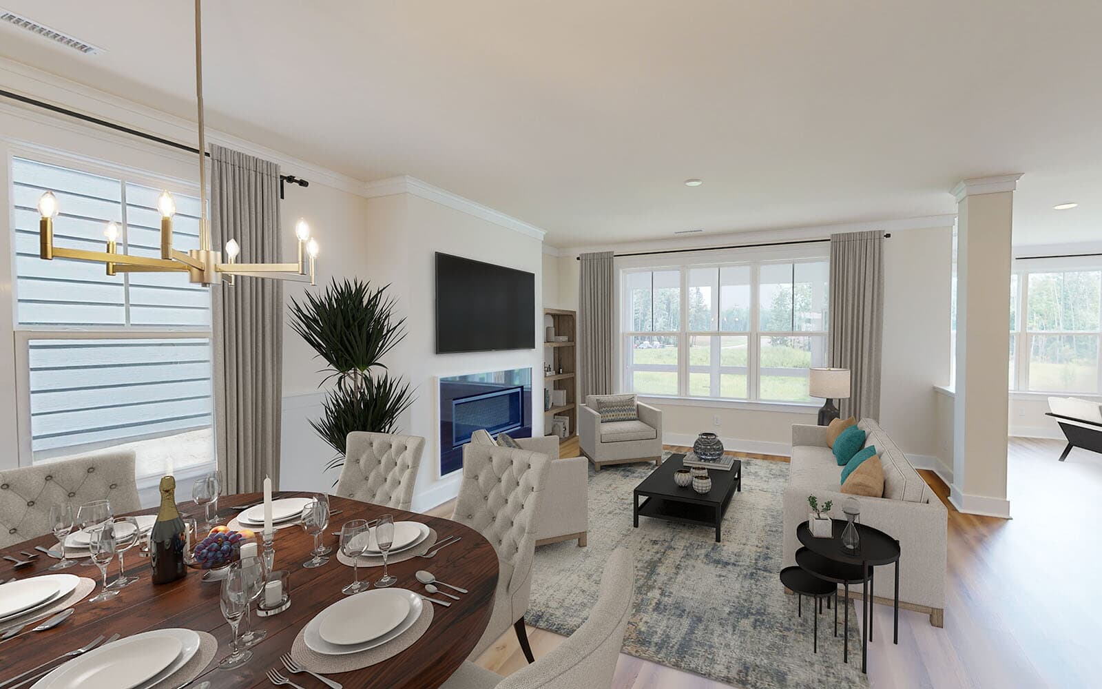 The dining room and great room of the Sinclair by Brookfield Residential