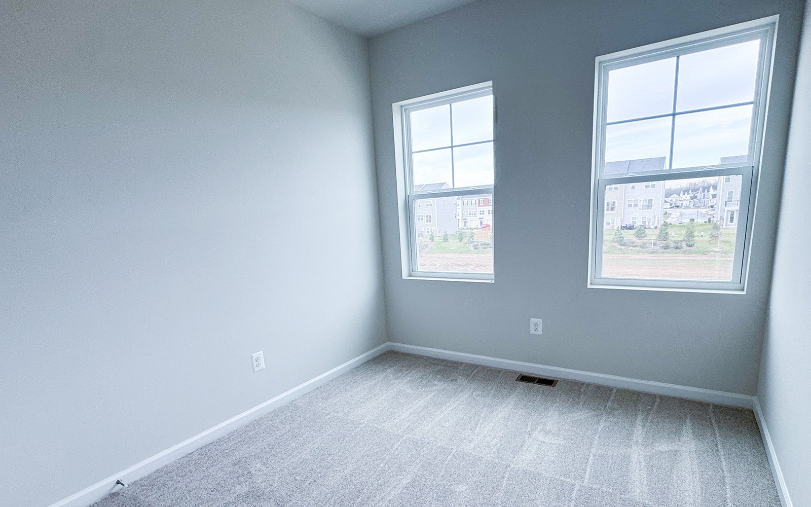 A secondary bedroom in the Skyline on homesite 2153 at Snowden Bridge.