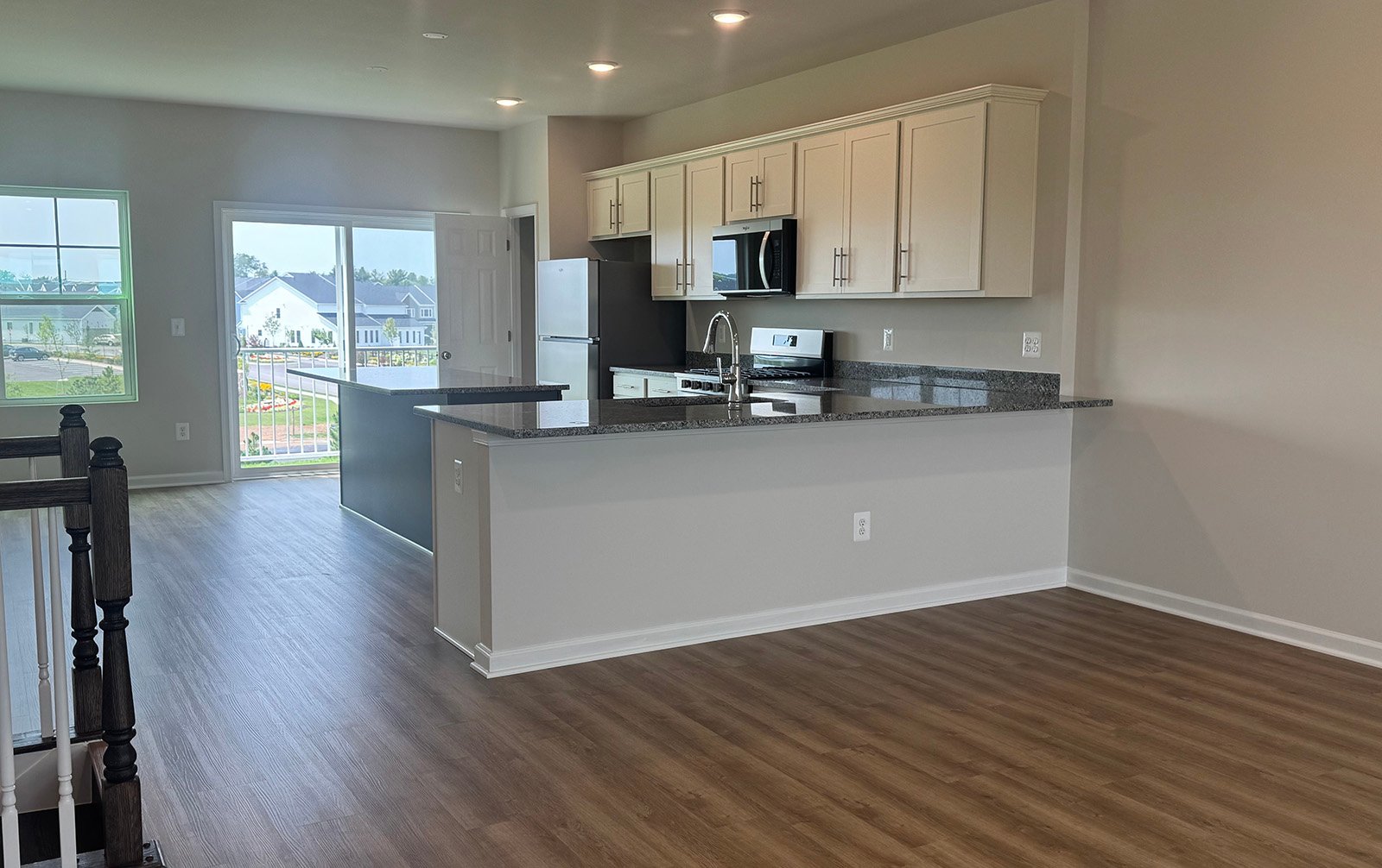 The dining room and kitchen of the Skyline on homesite 240015.