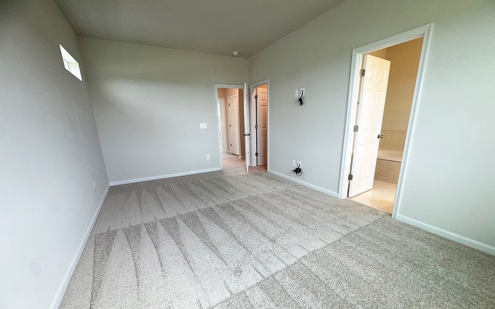 The primary suite of the Skyline on homesite 240015.