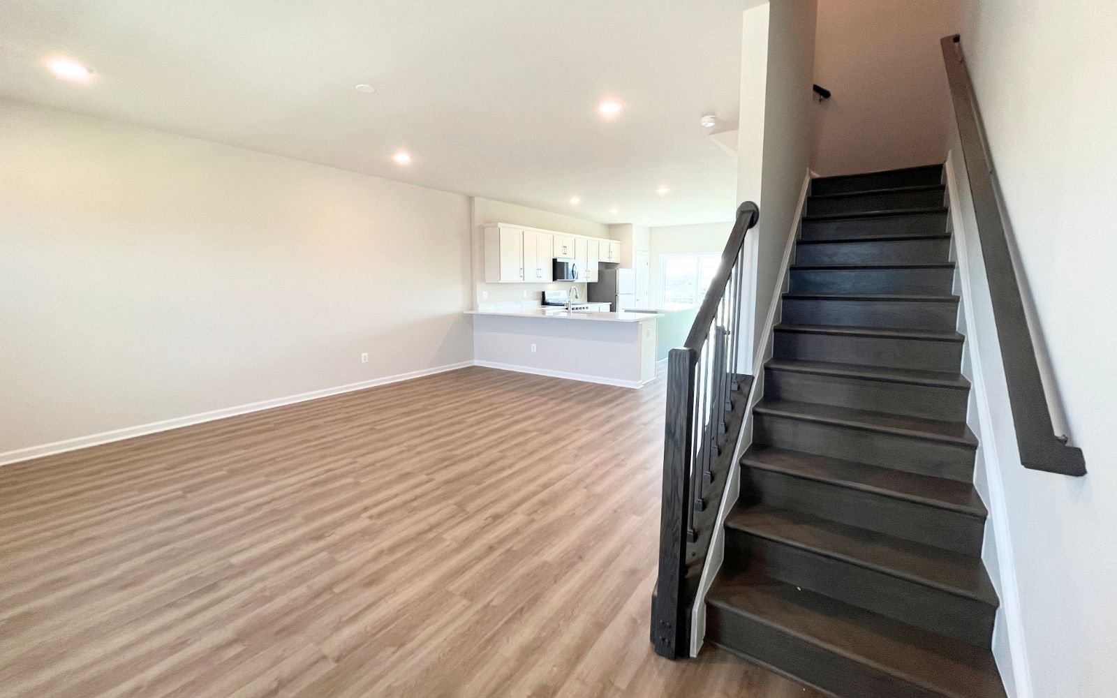 The family room of the Skyline on homesite 24016 at Snowden Bridge.