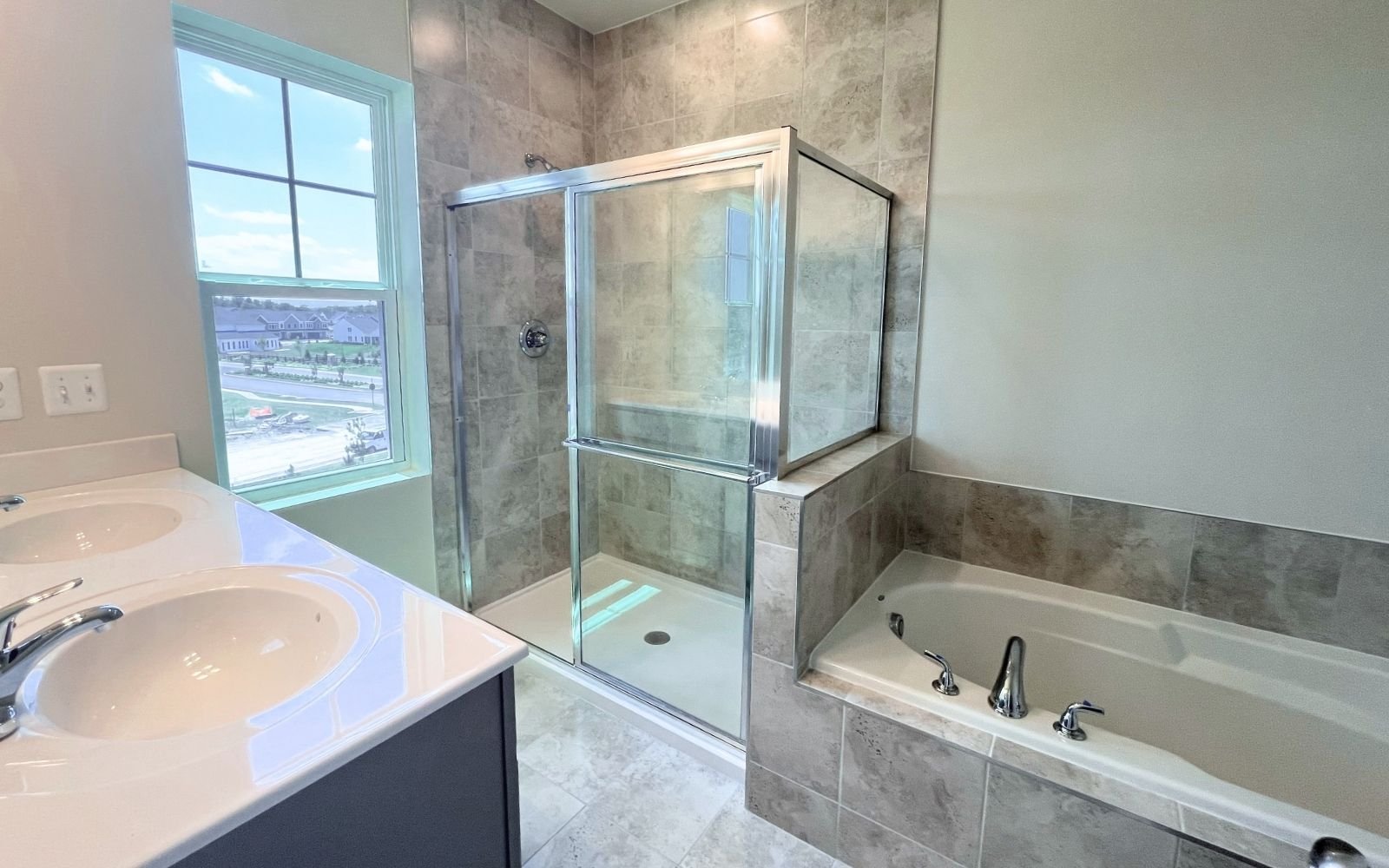 The primary bathroom of the Skyline on homesite 24016 at Snowden Bridge.