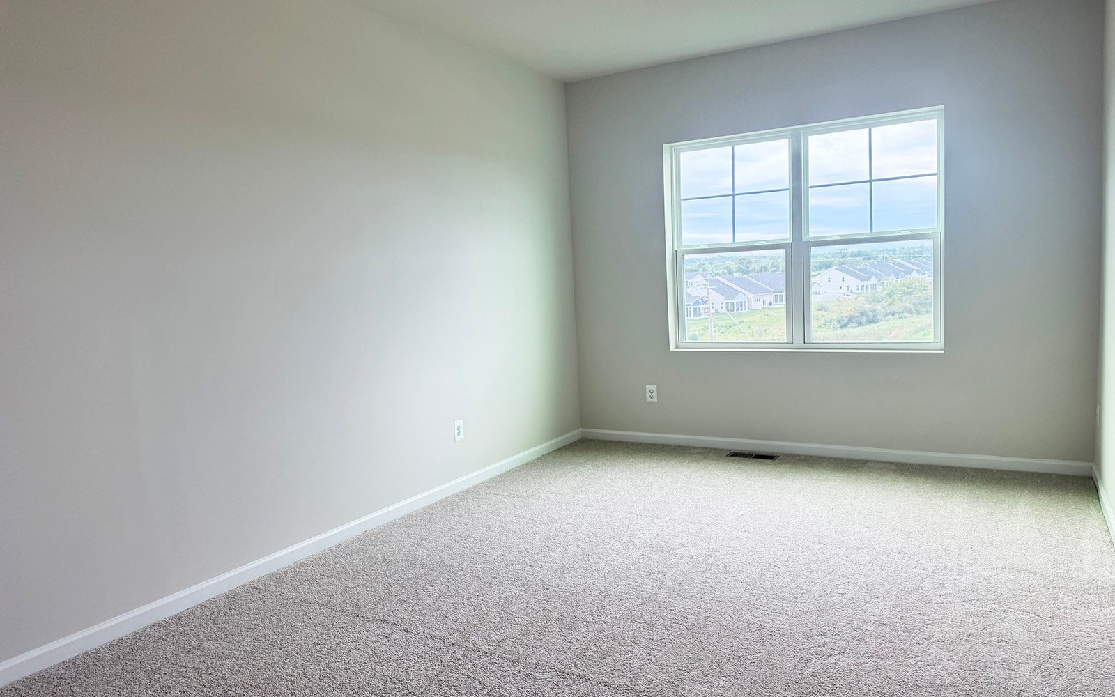 The primary bedroom of the Skyline on Homesite 24024.
