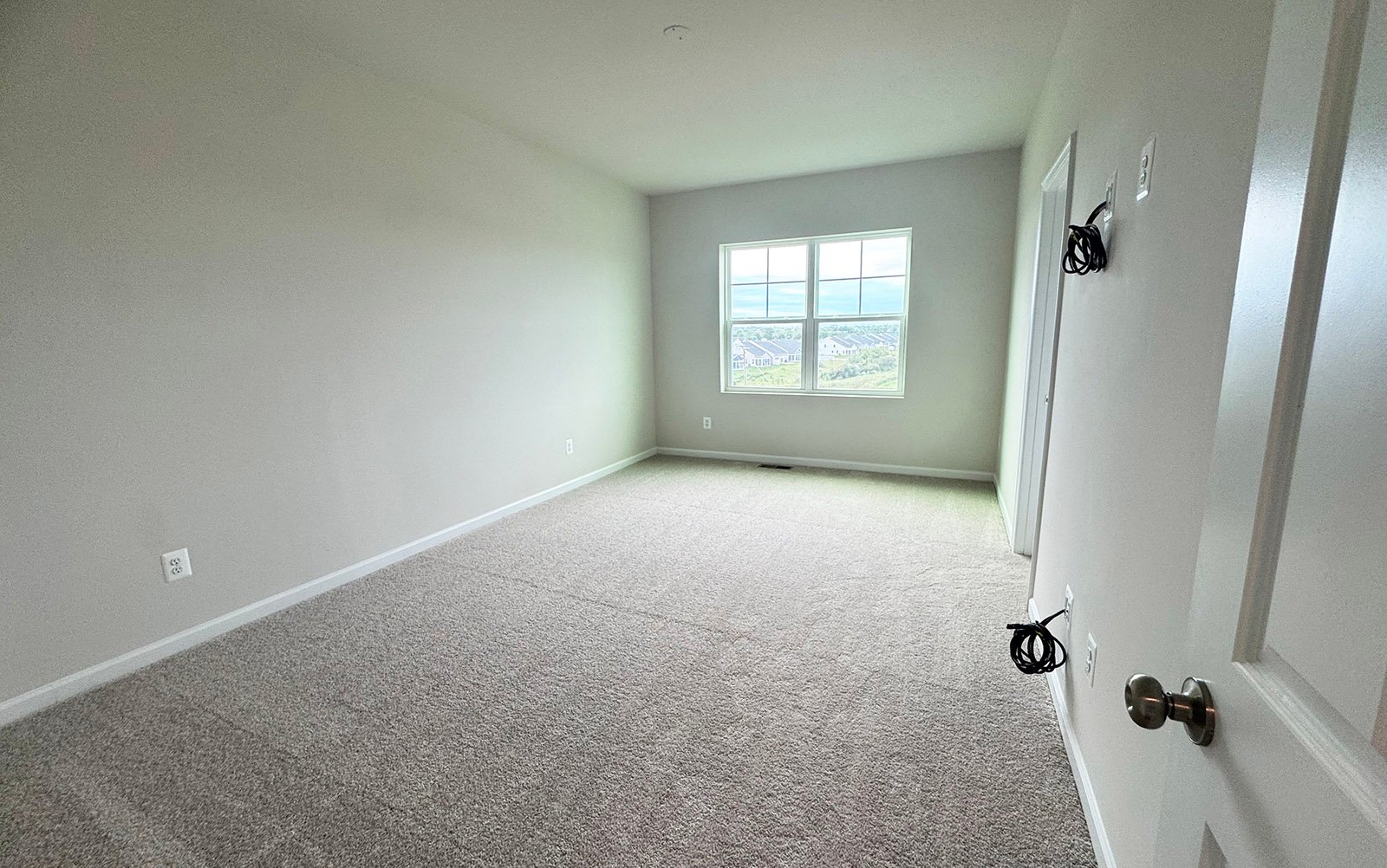 The primary bedroom of the Skyline on Homesite 24024.