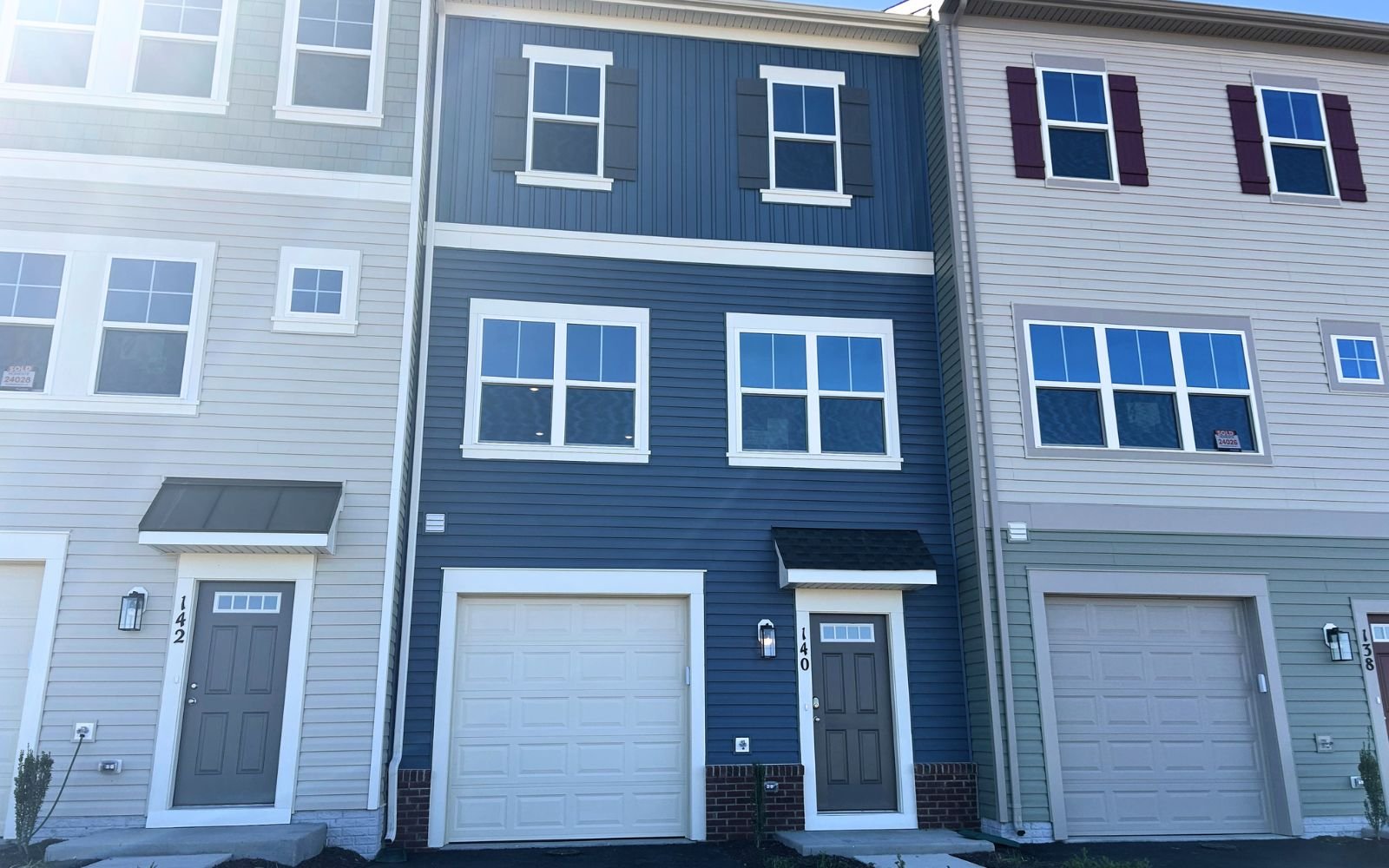 The exterior of the Skyline townhome on homesite 24027 at Snowden Bridge.