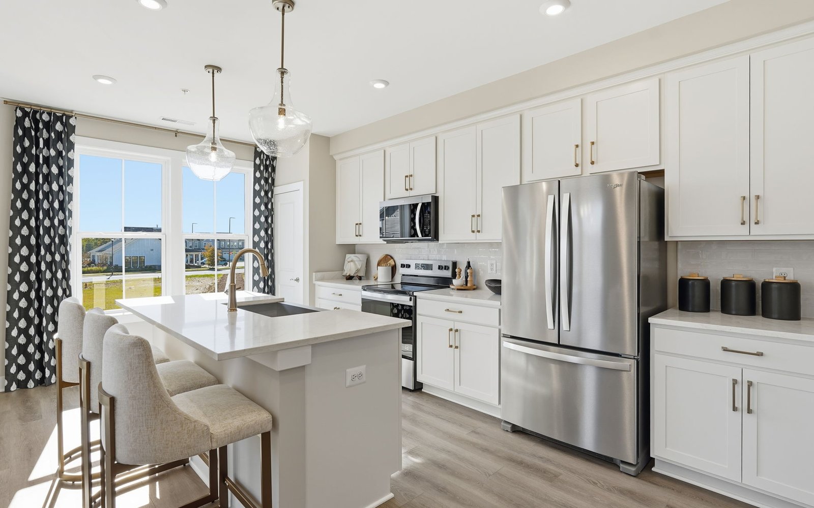 The kitchen of the Amber by Brookfield Residential.